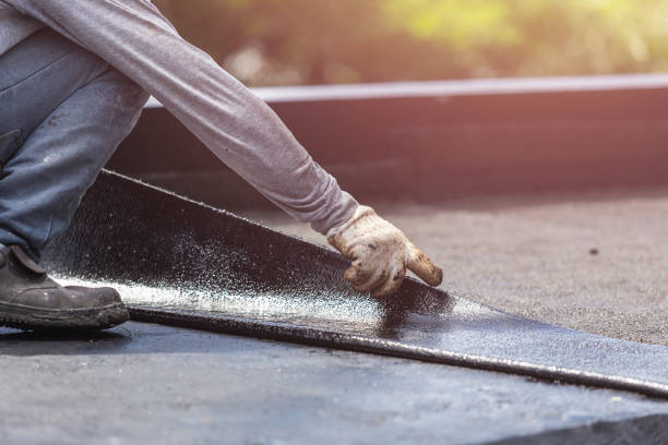 Professional Interior Drainage System technician working in Levittown, NY